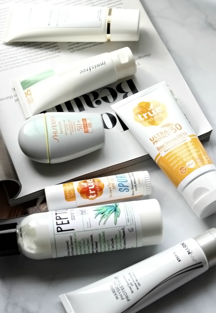 The Sunscreen Edit | The Best Sunscreens for Combination Skin - True Natural SPORT Stick SPF 30, True Natural Ultra Protect Antioxidant Sunscreen SPF 50, Erin's Faces Peptide SPF 30, Innisfree The Minimum Sun Cream SPF25, Jan Marini Marini Physical Protectant SPF 45, Shiseido Sports BB Broad Spectrum SPF 50+ WetForce, Institut Esthederm Into Repair Age Control Sunscreen, Exuviance Sheer Daily Protector SPF 50.