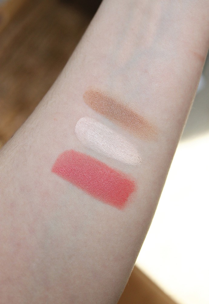 Swatches Clean, Non-Toxic Makeup from Hush + Dotti, Pressed Mineral Foundation in Beach Girl, Organic Concealer in Jane, Organic Mascara, Organic Lipstick in T-Bone