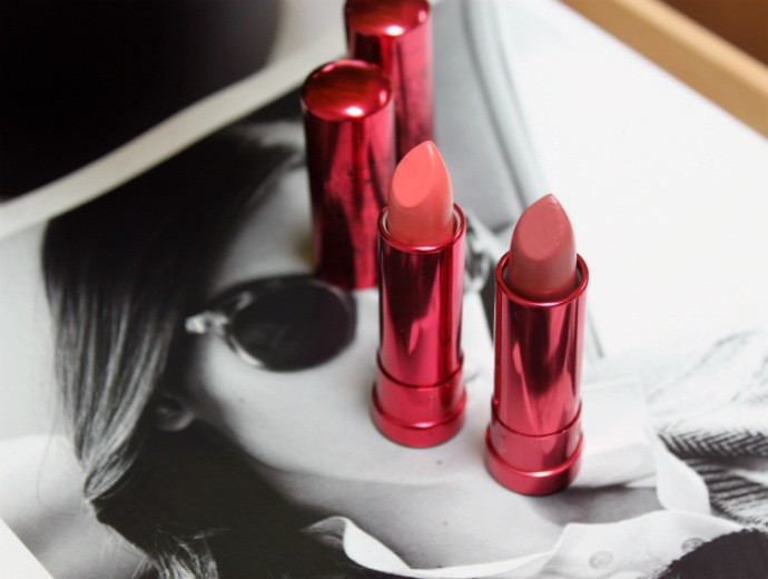 natural, Organic, Vegan, Non-toxic Lipstick Swatches L to R: NU Evolution Melon, NU Evolution Allure, 100% Pure Fruit Dandelion, 100% Pure Foxglove, Mineral Fusion Honeysuckle, Mineral Fusion Ripe, Mineral Fusion Blackberry, Hush + Dotti T-bone, 100% Pure Sonora, Benecos Watermelon.